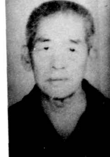 一位老年男性，面部表情平和。